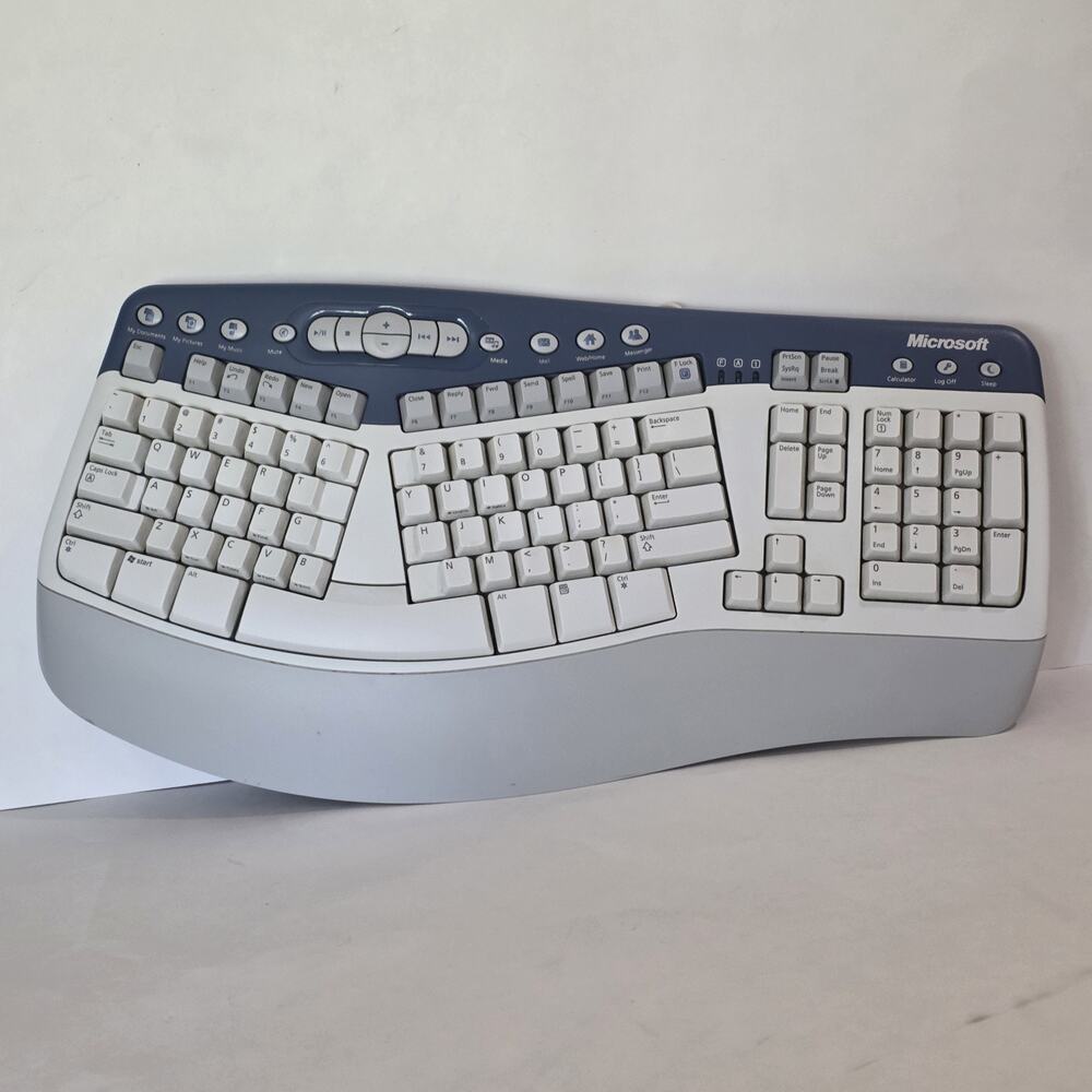 Microsoft Natural MultiMedia Keyboard 1.0A Ergonomic RT9470 PS/2 Blue Ergo